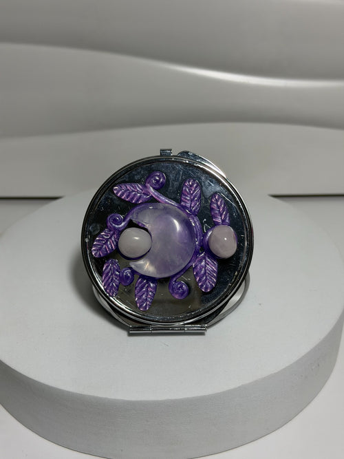 Amethyst crystal pocket mirror with moon and botanical design