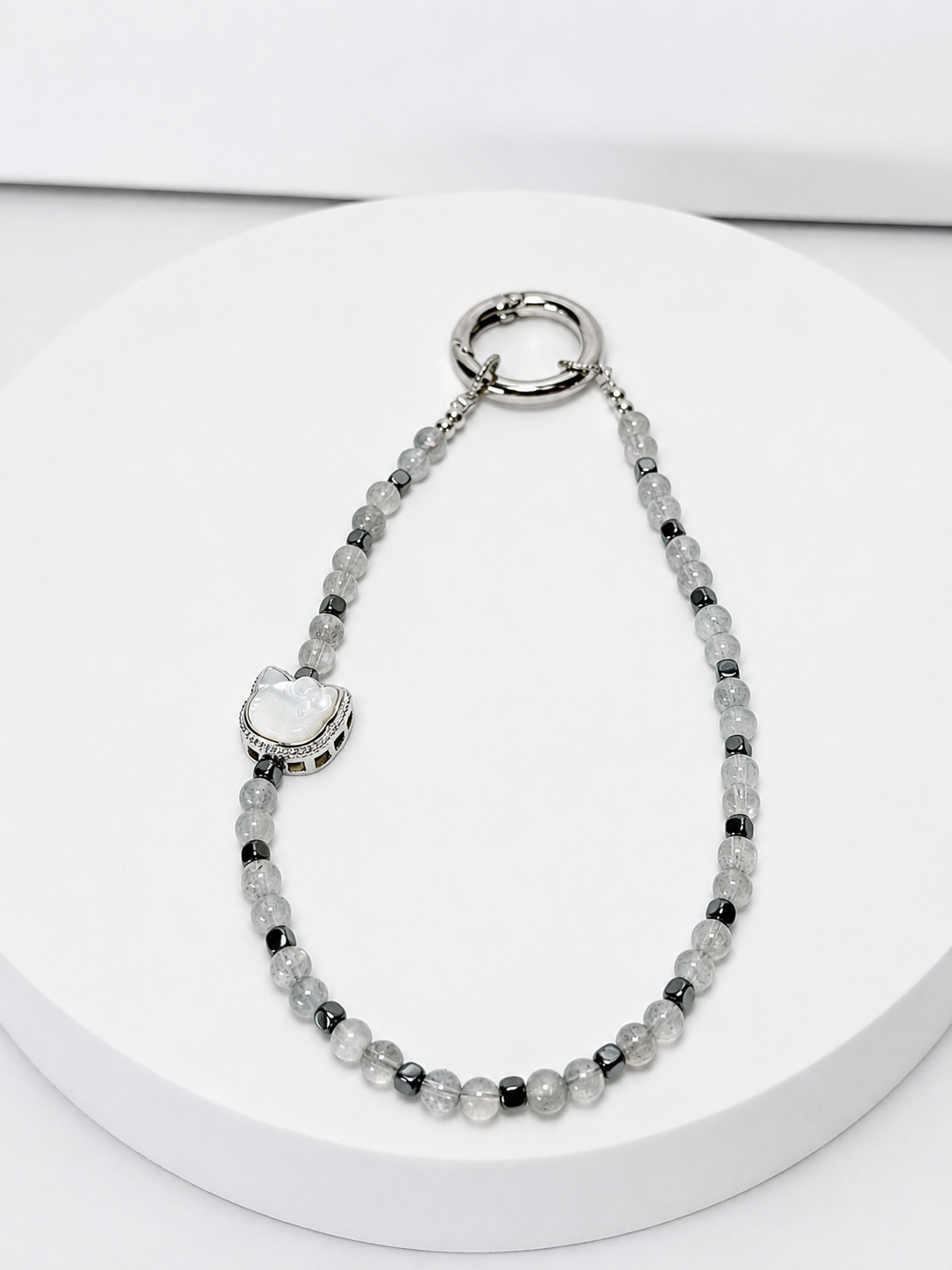 Labradorite, moonstone and hematite phone and bag charm with moonstone kitty accent and silver-tone hardware