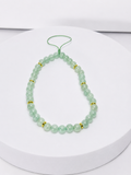 Green aventurine beaded phone and bag charm with gold-tone accents and green cord loop