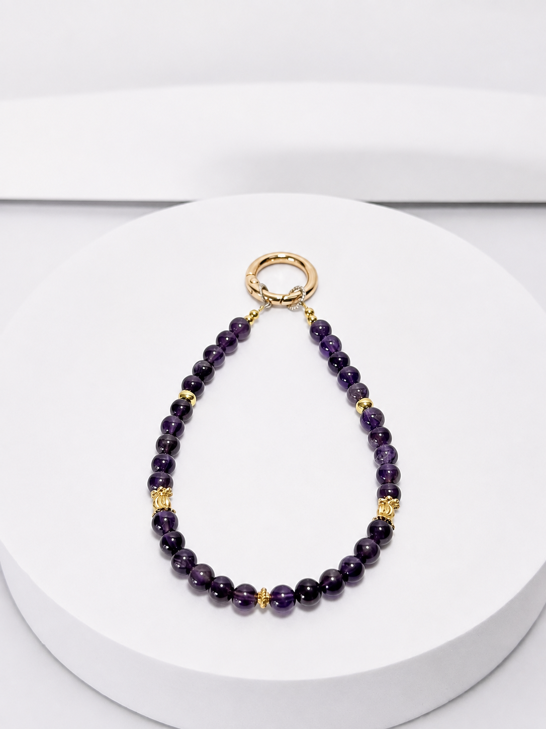 Amethyst 6mm bead phone and bag charm with gold-tone accents and gold clasp