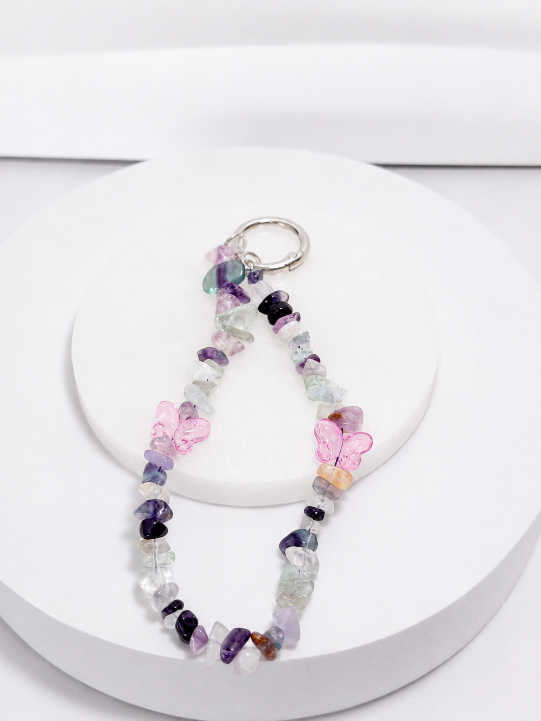 Fluorite chip bead phone and bag charm with pink butterfly accents and silver-tone hardware