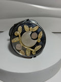 Clear quartz crystal pocket mirror with moon and botanical design