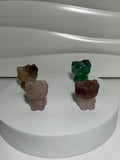 Blue, pink, and purple fluorite Hello Kitty crystal carvings
