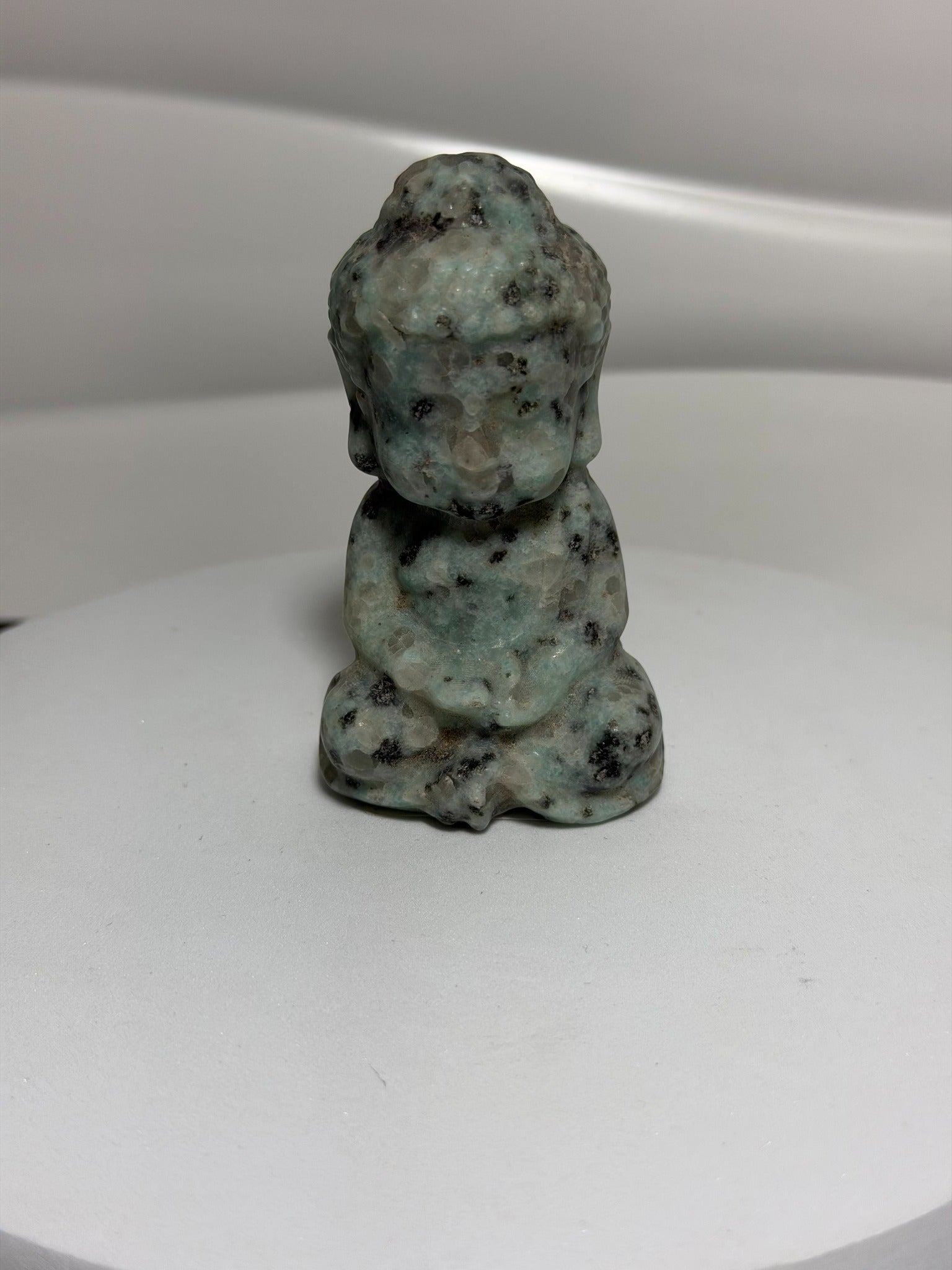 Kiwi stone Buddha crystal carving