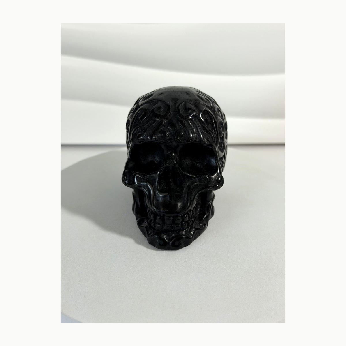 Black Obsidian skull carving front view