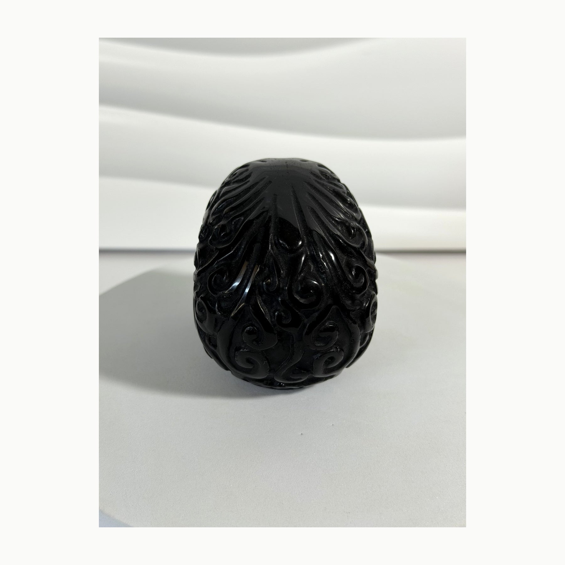 Black Obsidian skull carving reverse view