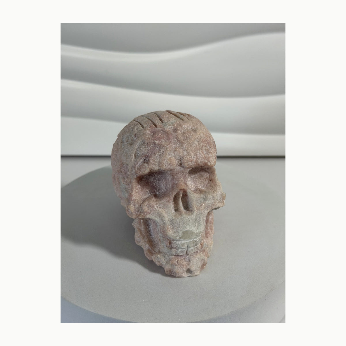 Pink Opal skull carving front view