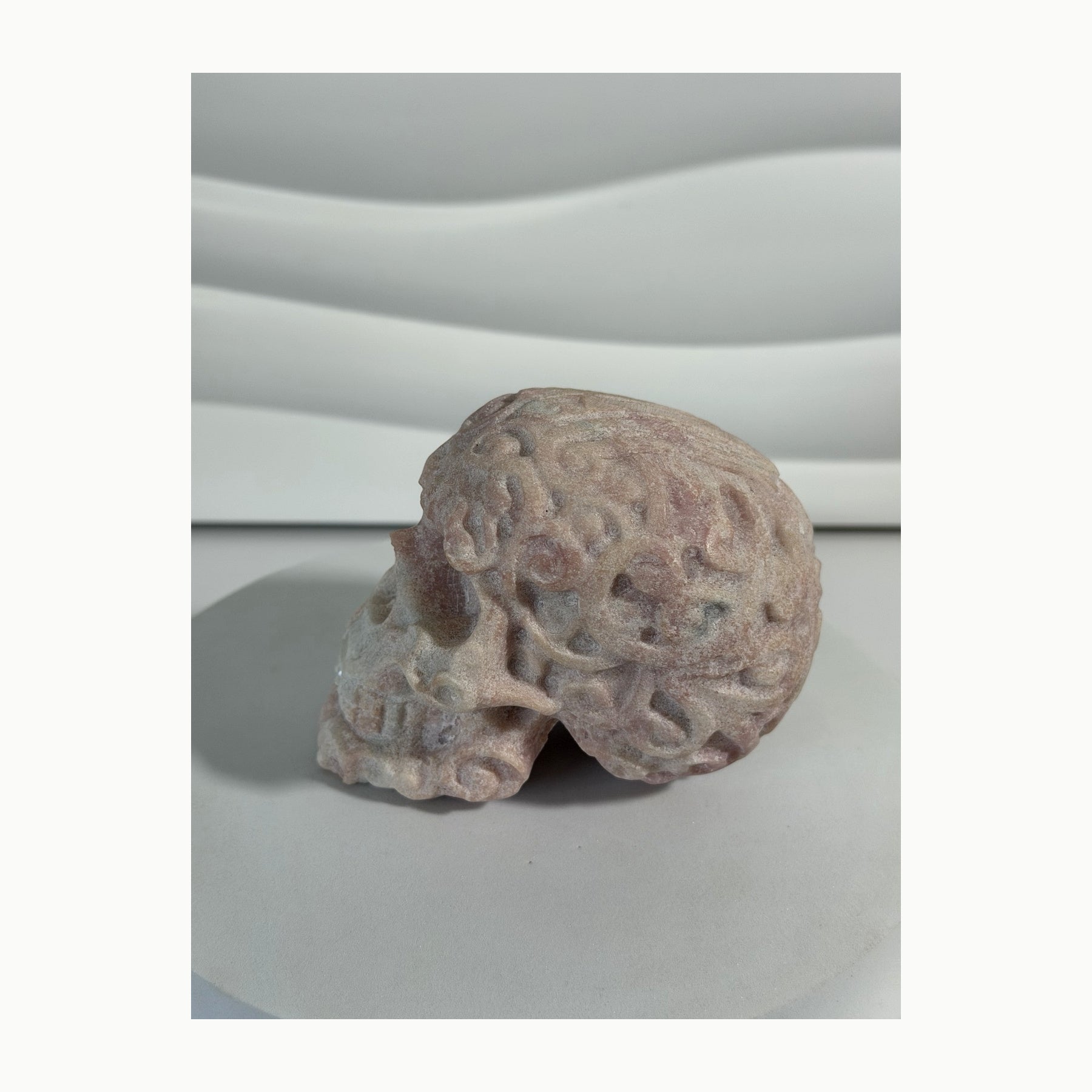 Pink Opal skull carving alternate side view