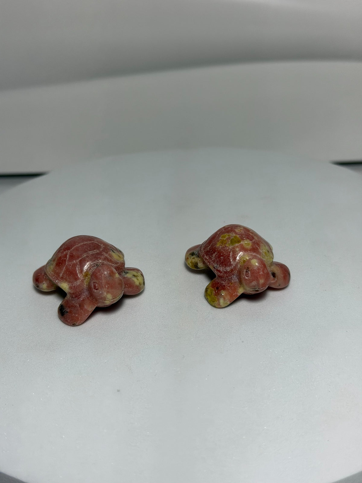 Pink Opal turtle crystal carvings group view