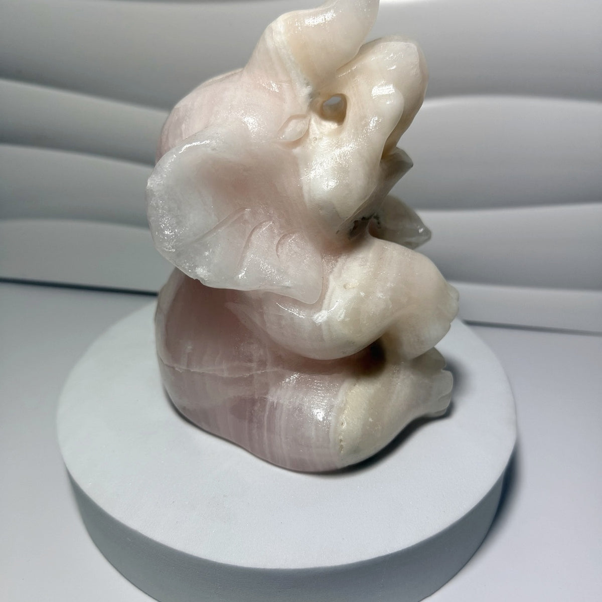 Large pink calcite elephant carving front view