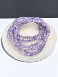 Lavender Moon Quartz 4mm faceted stretch bracelet on white stone display