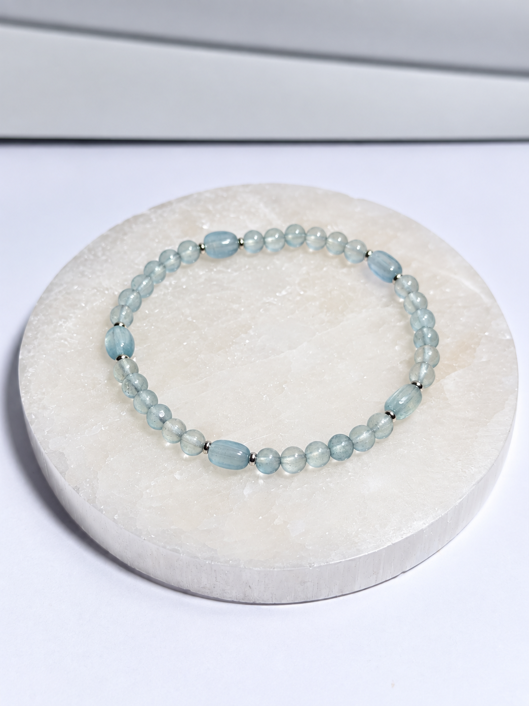 3mm Aquamarine stretch bracelet with polished barrel accents and silver-tone spacers
