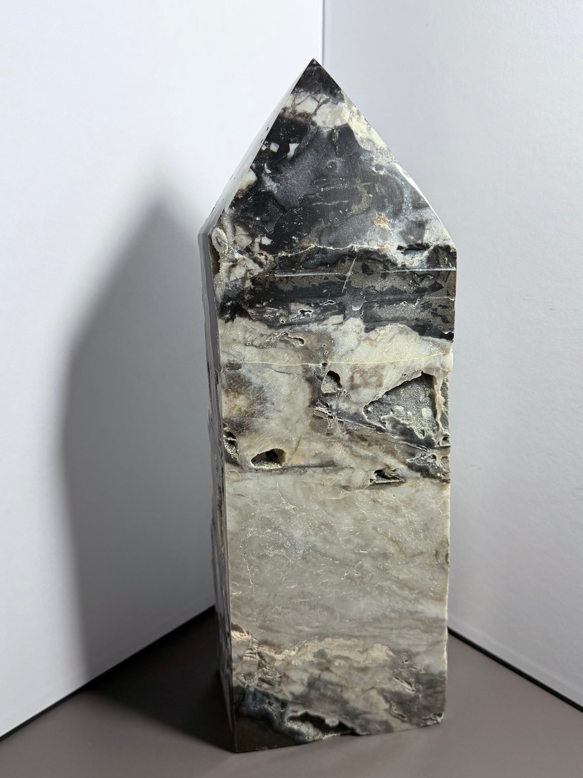 13-inch 7-pound druzy chalcedony tower polished back view with gray white and black natural patterning