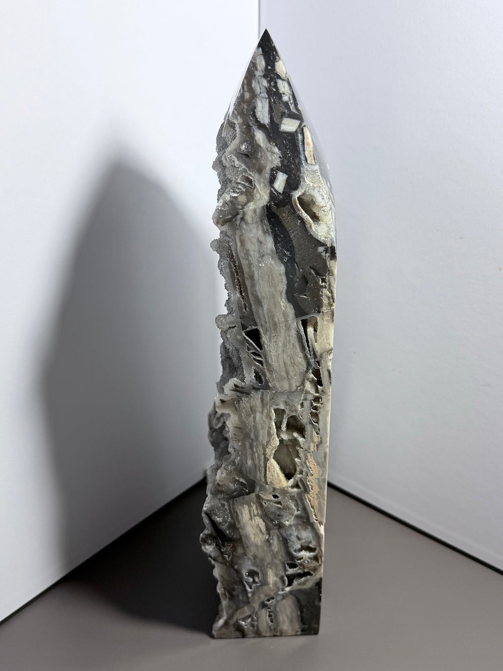 13-inch 7-pound druzy chalcedony tower opposite side view with polished stone and natural druzy cavities