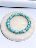 Mindful Whisper Larimar stretch barrel bead bracelet