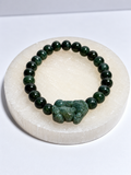 Dark green nephrite jade 7 mm stretch bracelet with carved Pixiu focal