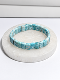 Standard grade natural Dominican Larimar pill-shaped stretch bracelet