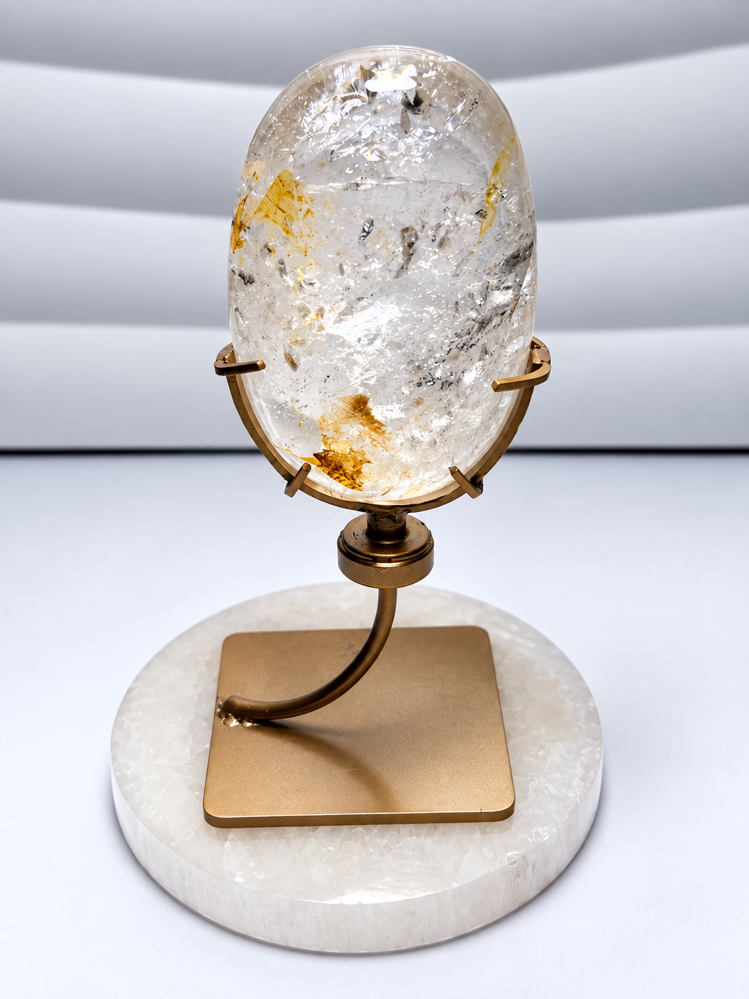 Top quality Himalayan quartz 3-inch palm stone on included metal stand