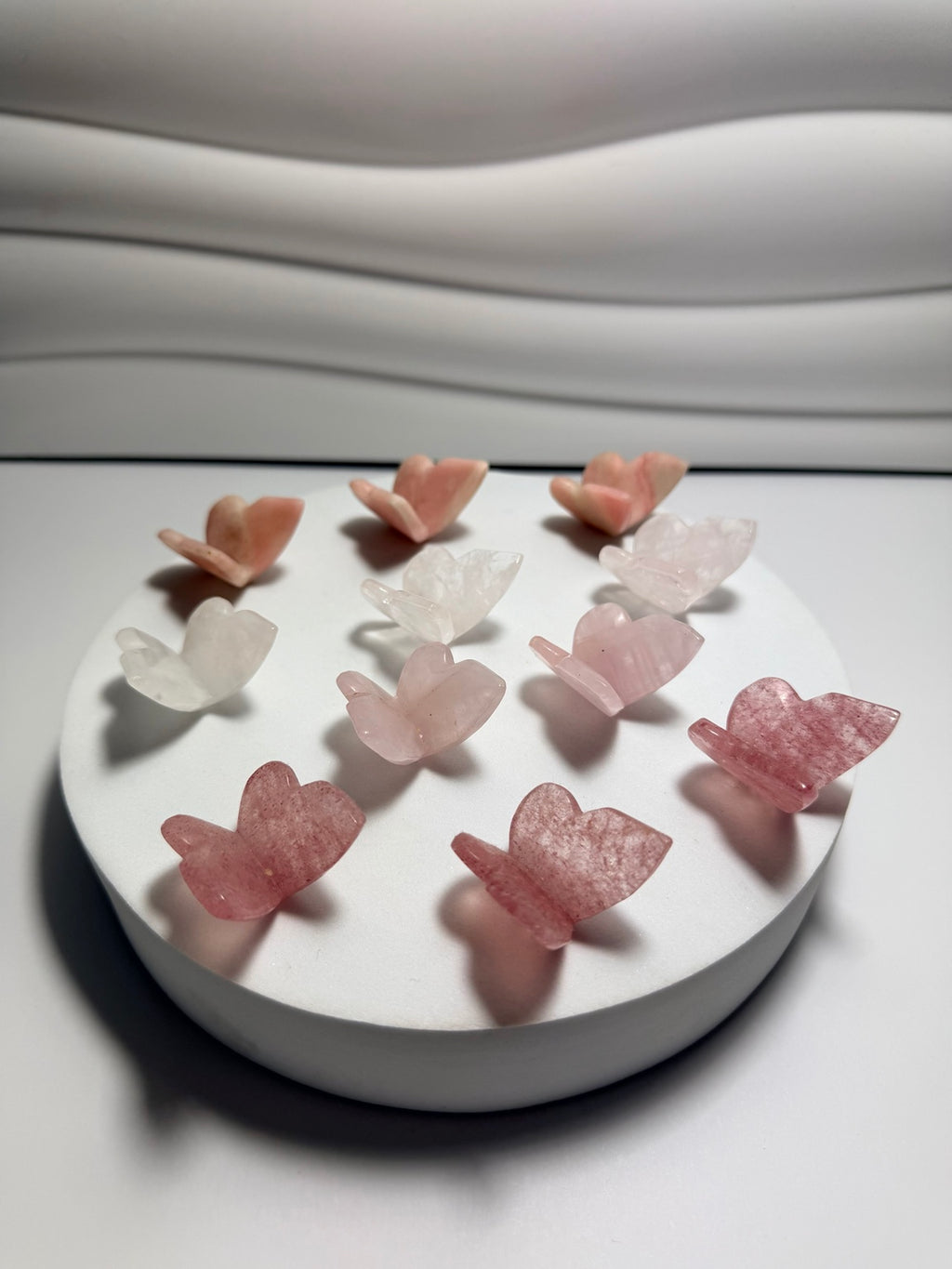 Mini crystal butterfly carvings in cherry quartz rose quartz clear quartz and pink opal
