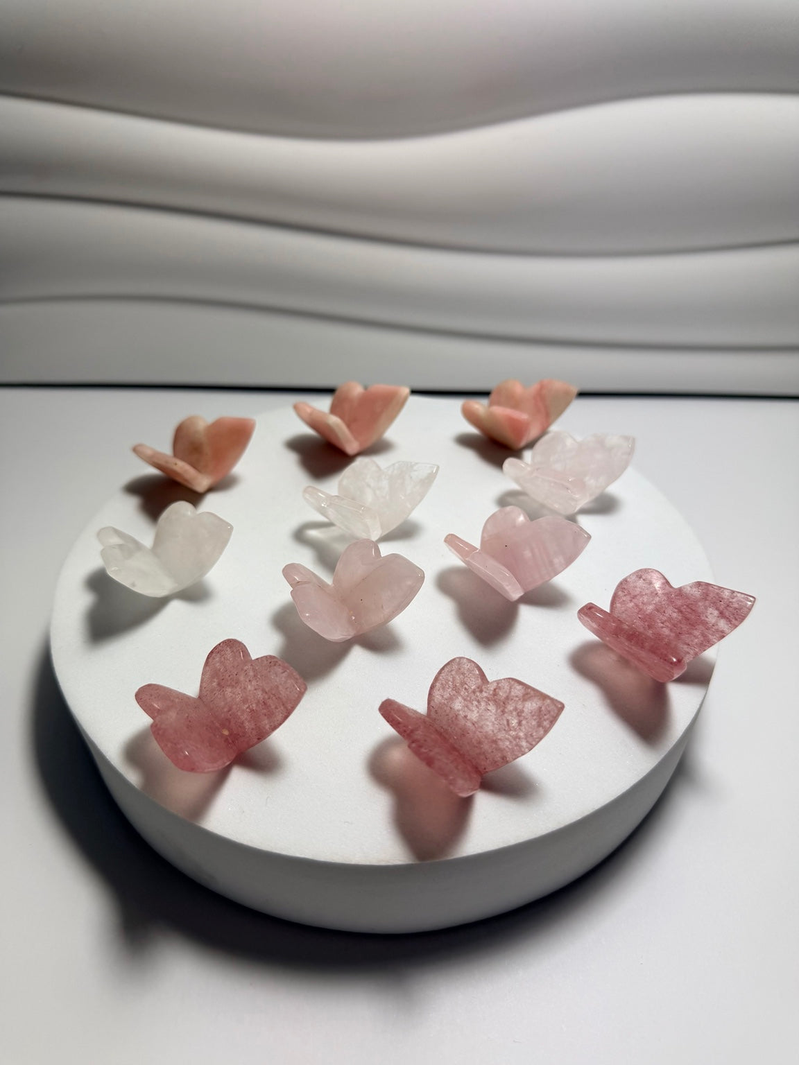 Mini crystal butterfly carvings in cherry quartz rose quartz clear quartz and pink opal