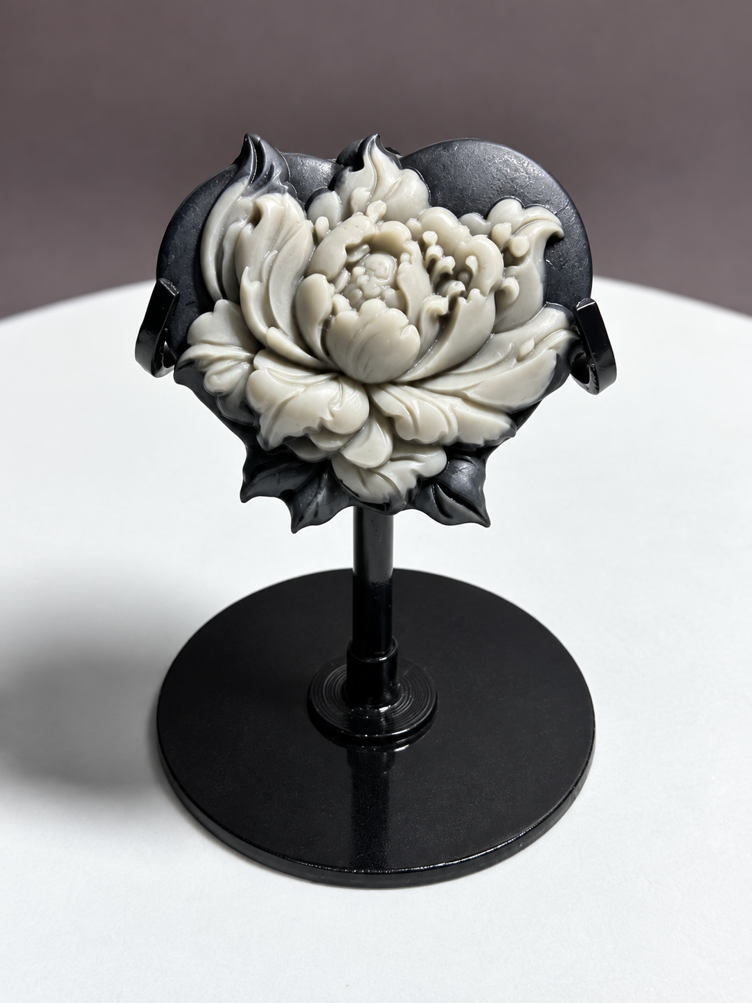 Tai Chi Stone peony flower relief carving on black display stand